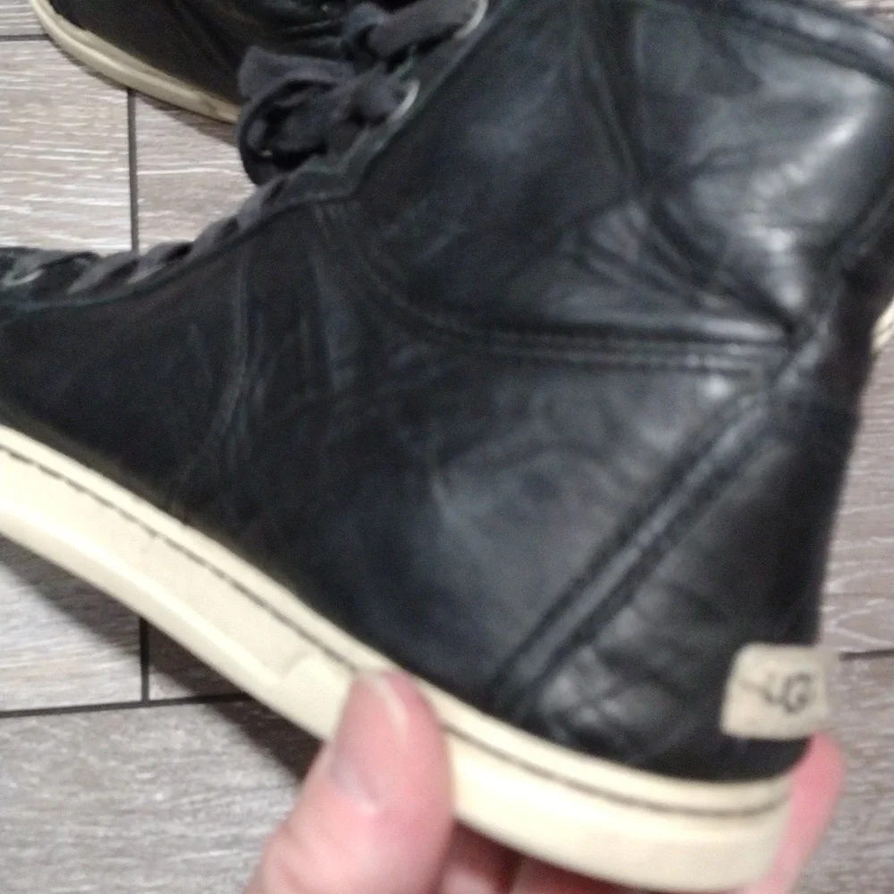 UGG womens black leather zip or lace high top sneakers. Size 8
